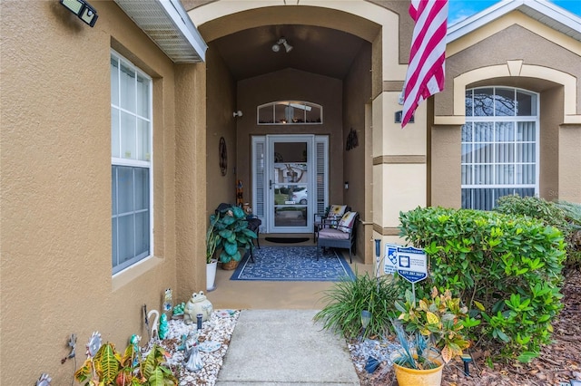 130 Bloomingdale Dr, Davenport, FL 33897 - property entrance with stucco siding