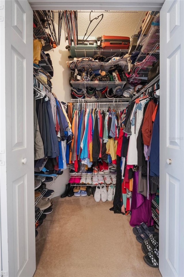130 Bloomingdale Dr, Davenport, FL 33897 - walk in closet featuring carpet flooring
