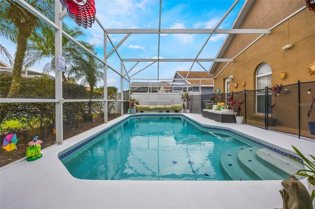 130 Bloomingdale Dr, Davenport, FL 33897 - view of swimming pool with a patio and glass enclosure