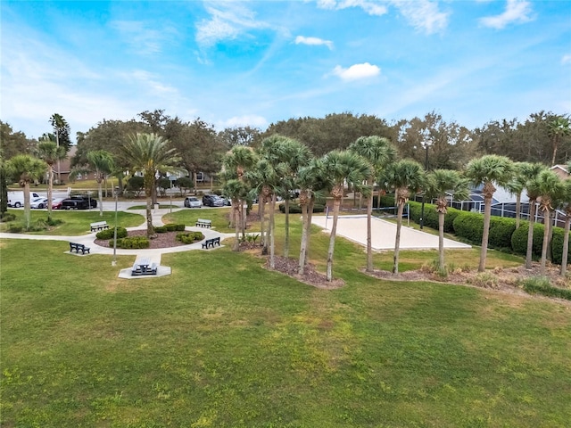 130 Bloomingdale Dr, Davenport, FL 33897 - surrounding community with a yard and volleyball court