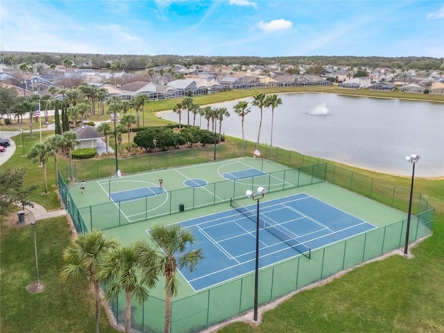 130 Bloomingdale Dr, Davenport, FL 33897 - view of tennis court with a residential view, a water view, and community basketball court