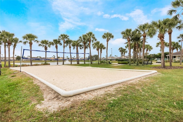 130 Bloomingdale Dr, Davenport, FL 33897 - view of community featuring volleyball court, a lawn, and a water view