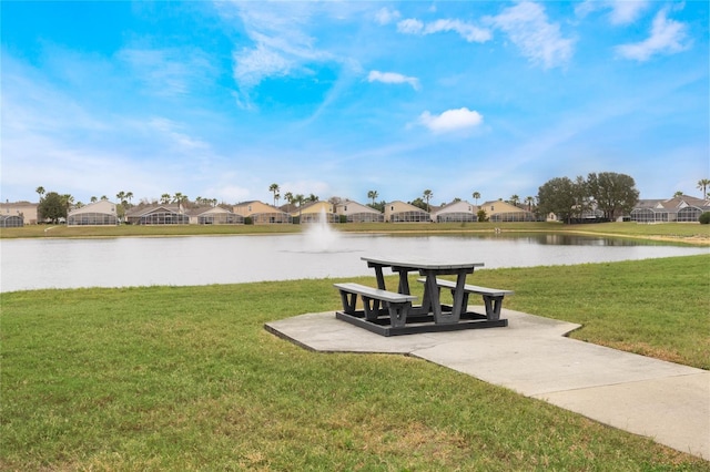 130 Bloomingdale Dr, Davenport, FL 33897 - surrounding community featuring a water view, a residential view, and a yard
