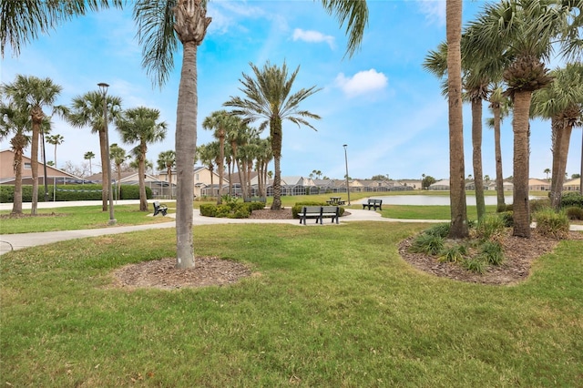 130 Bloomingdale Dr, Davenport, FL 33897 - surrounding community featuring a yard, a water view, and a residential view
