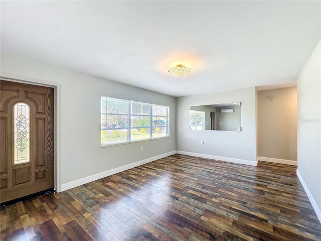 entrance foyer featuring dark hardwood / wood-style floors