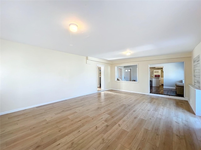 unfurnished living room featuring light hardwood / wood-style flooring