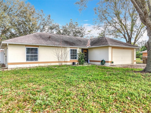 ranch-style house with a garage, a shingled roof, a front lawn, and stucco siding