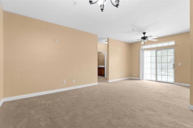 carpeted empty room with ceiling fan