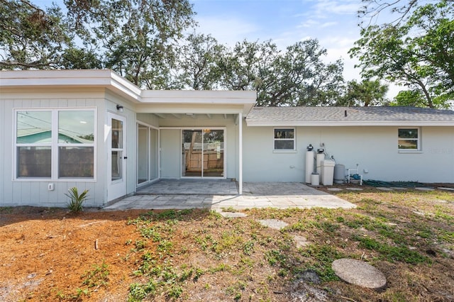 rear view of house with a patio