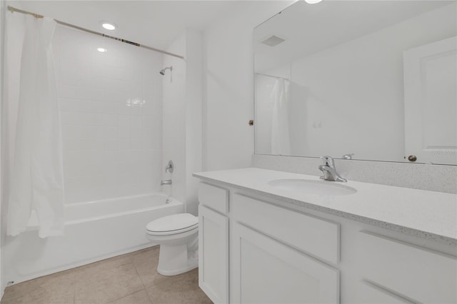 1620 Pelican Dr, Davenport, FL 33896 - full bathroom with toilet, tile patterned flooring, vanity, and shower / bath combination with curtain