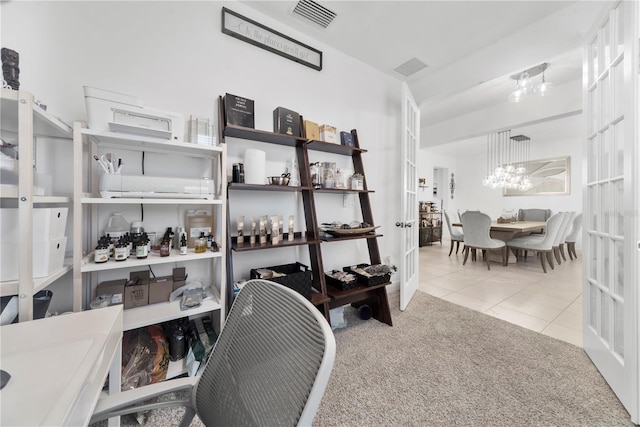 storage area featuring french doors and visible vents