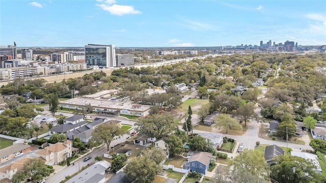 birds eye view of property featuring a city view