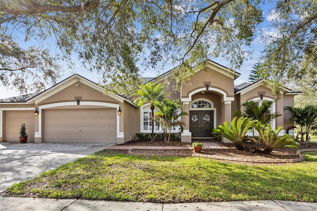 ranch-style home featuring a garage, french doors, and a front yard