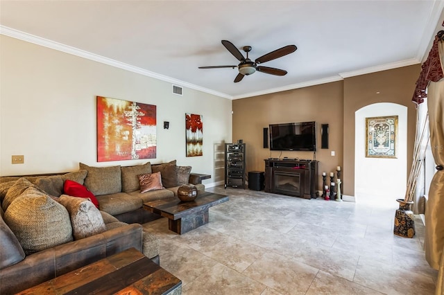 living room with ceiling fan, ornamental molding, and light tile patterned floors