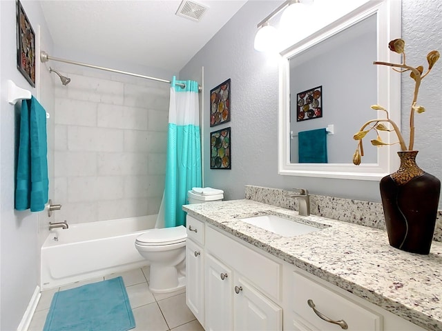 full bathroom with shower / tub combo with curtain, visible vents, toilet, vanity, and tile patterned floors