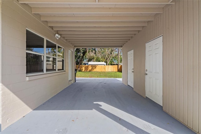 view of patio featuring fence