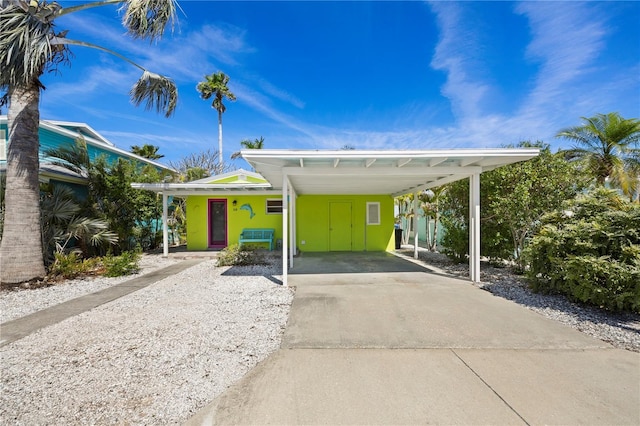 view of vehicle parking with driveway