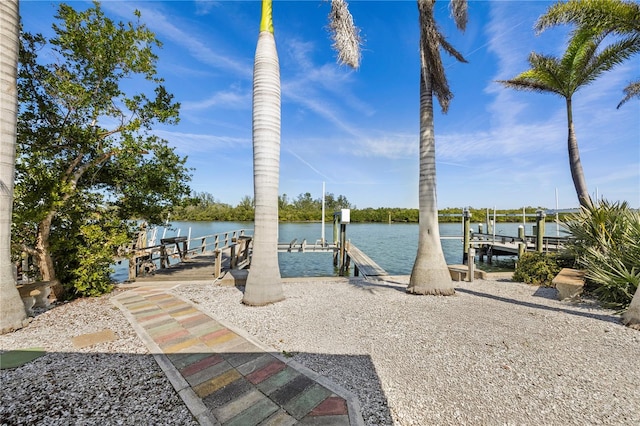 dock area featuring a water view and boat lift