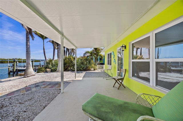 view of patio featuring a water view