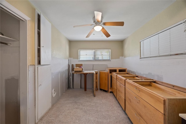 office area with light carpet and ceiling fan