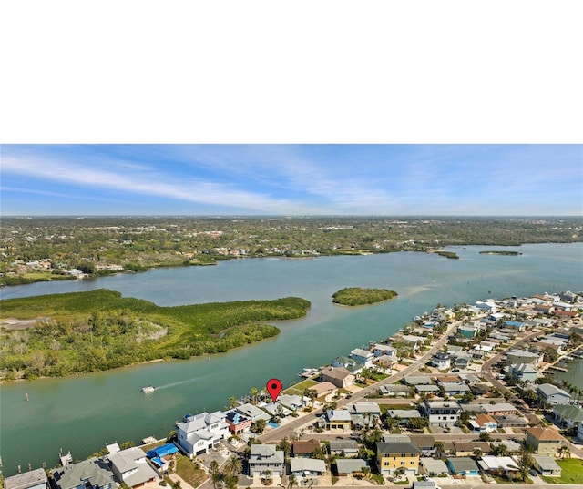 aerial view with a residential view and a water view