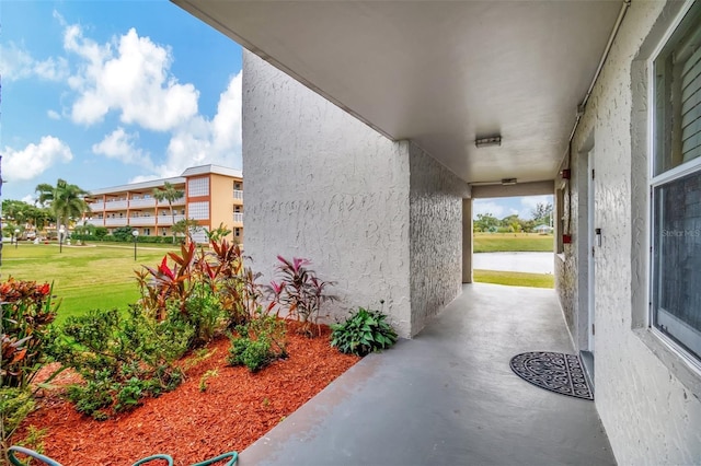 view of patio / terrace featuring a water view