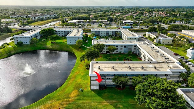 drone / aerial view with a water view