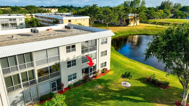 view of building exterior with a water view