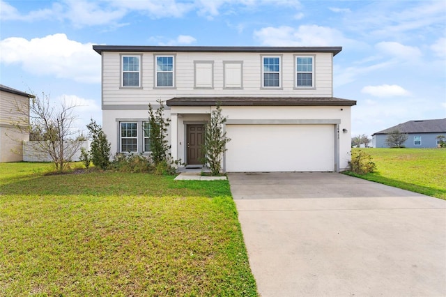 traditional-style house with driveway, a garage, and a front lawn