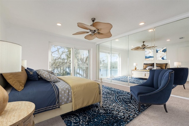 carpeted bedroom featuring visible vents, recessed lighting, a ceiling fan, and access to exterior