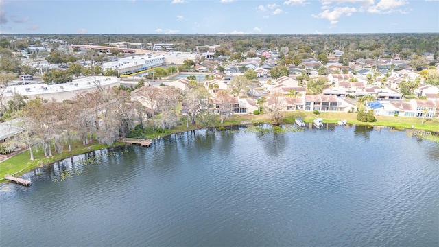 aerial view featuring a water view and a residential view