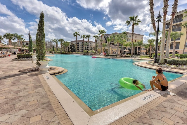 pool with a patio