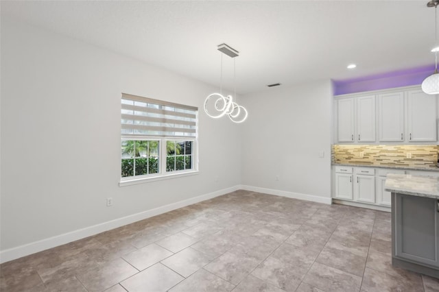 interior space with light tile patterned floors