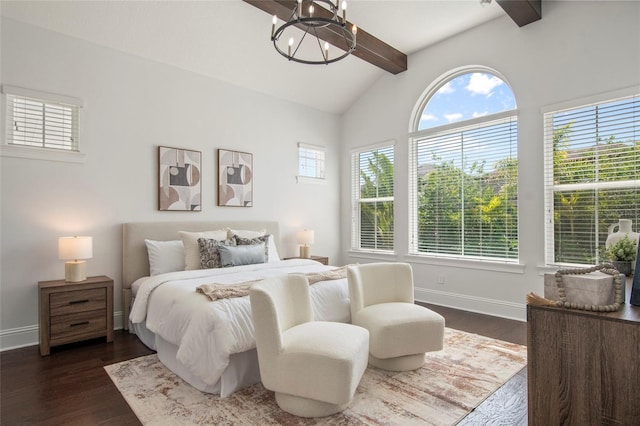 bedroom featuring vaulted ceiling with beams, multiple windows, a notable chandelier, and dark wood finished floors