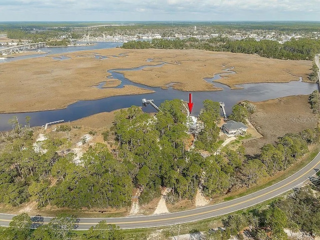 drone / aerial view featuring a water view