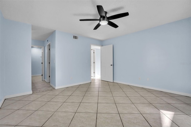 1008 Birkdale Trl, Winter Springs, FL 32708 - empty room featuring visible vents, light tile patterned floors, a ceiling fan, and baseboards