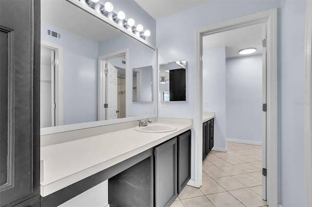 1008 Birkdale Trl, Winter Springs, FL 32708 - bathroom featuring vanity, tile patterned flooring, visible vents, and baseboards
