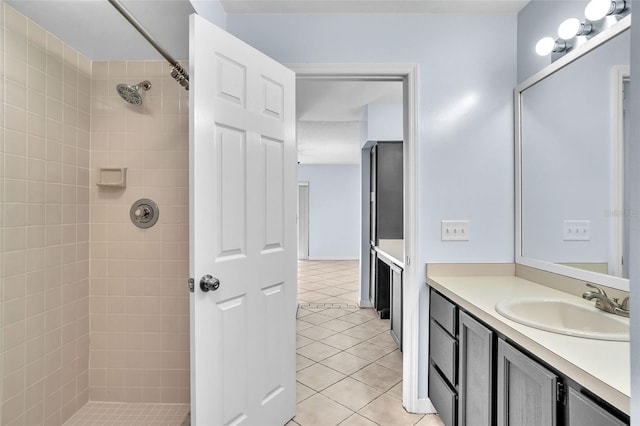 1008 Birkdale Trl, Winter Springs, FL 32708 - full bathroom with a tile shower, vanity, and tile patterned floors