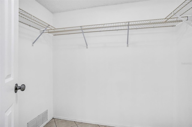 1008 Birkdale Trl, Winter Springs, FL 32708 - walk in closet with light tile patterned floors and visible vents
