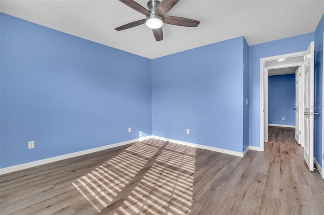 1008 Birkdale Trl, Winter Springs, FL 32708 - empty room with light wood-style floors, ceiling fan, and baseboards