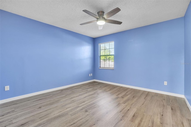 1008 Birkdale Trl, Winter Springs, FL 32708 - unfurnished room with baseboards, ceiling fan, a textured ceiling, and light wood finished floors