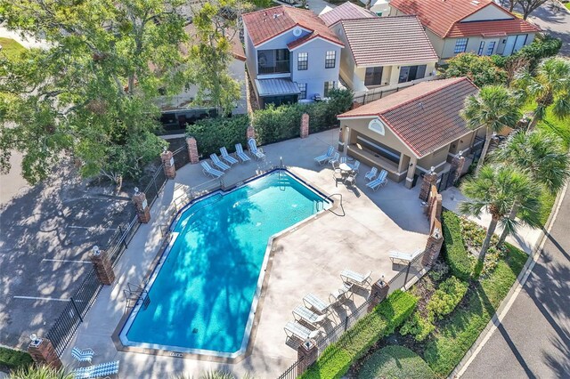 1008 Birkdale Trl, Winter Springs, FL 32708 - pool with a patio and fence
