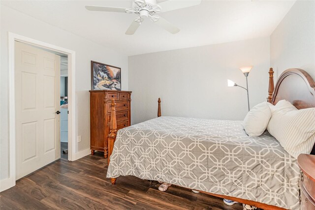 bedroom with dark wood-type flooring and ceiling fan