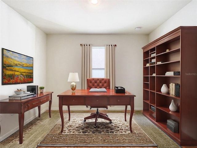 office with carpet floors and baseboards