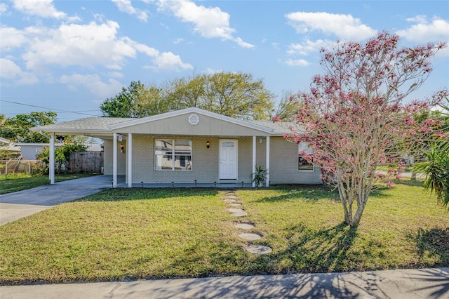 single story home featuring a front yard and a carport