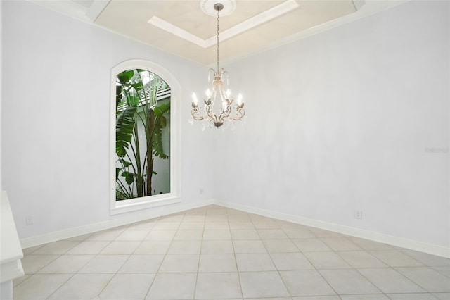 5138 Fairway Oaks Dr, Windermere, FL 34786 - spare room with a tray ceiling, an inviting chandelier, light tile patterned flooring, and baseboards