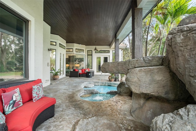 5138 Fairway Oaks Dr, Windermere, FL 34786 - view of patio / terrace featuring an outdoor hangout area and french doors