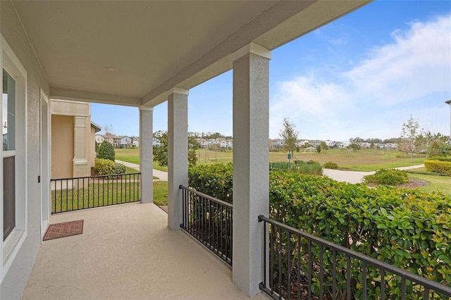 balcony featuring covered porch