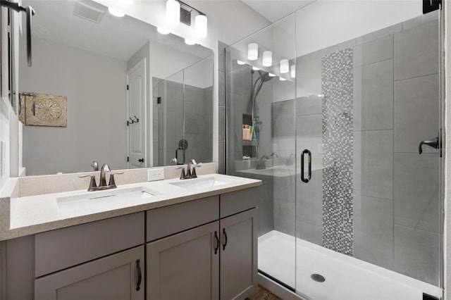 bathroom with vanity and walk in shower