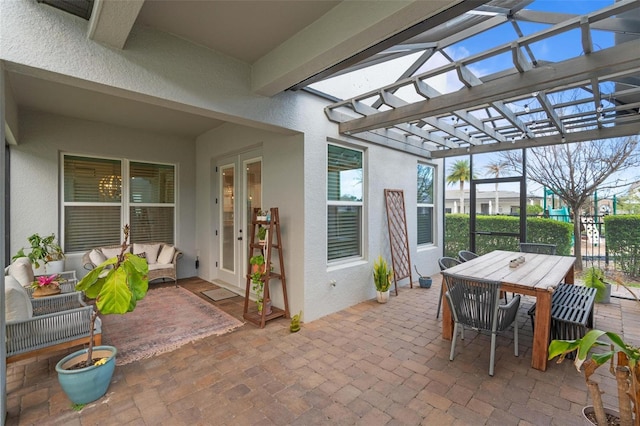 view of patio with an outdoor living space and a pergola